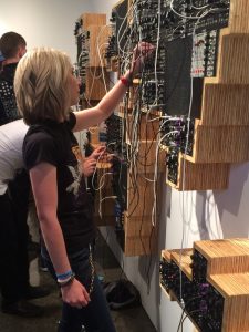 girl in Moog shop